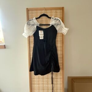 Black One Piece Swimsuit with Sheer White Puff Sleeves